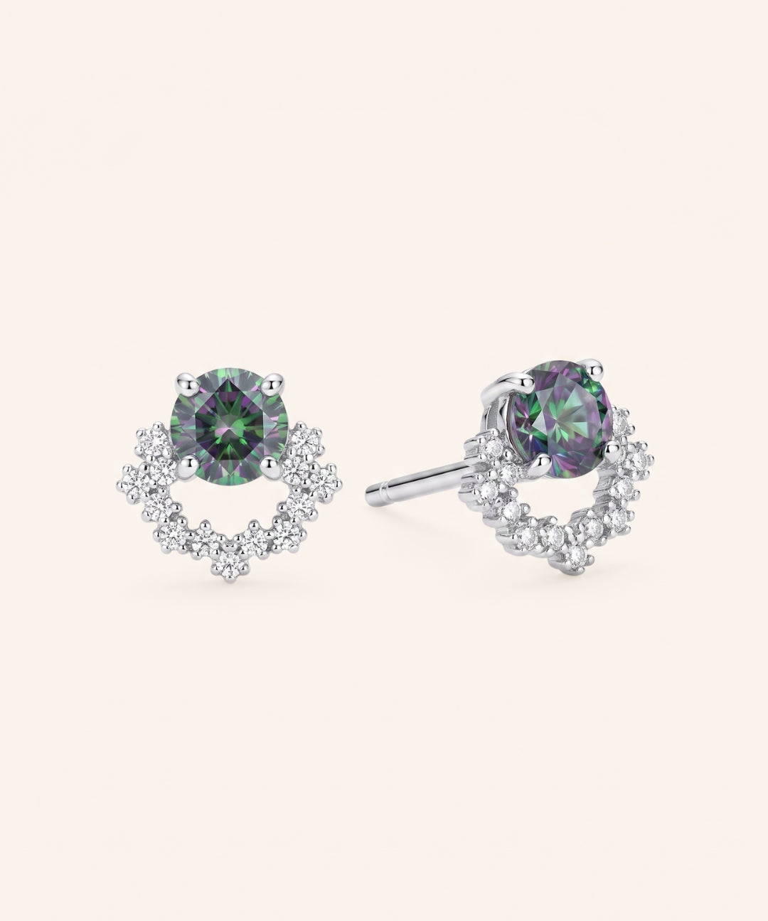 Pair of Starlight Crown Crescent Moissanite Stud Earrings in sterling silver with round Celestial Teal moissanite stones and pavé arc frames.