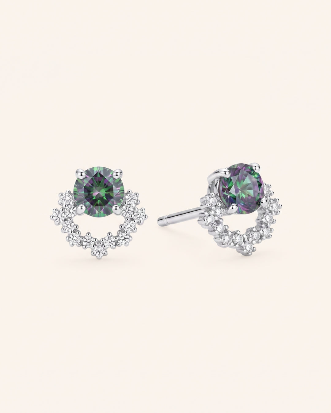 Pair of Starlight Crown Crescent Moissanite Stud Earrings in sterling silver with round Celestial Teal moissanite stones and pavé arc frames.