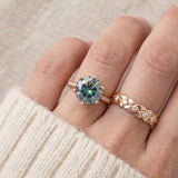 3 Carat Mystic Moissanite Ring in rose gold, worn on a model