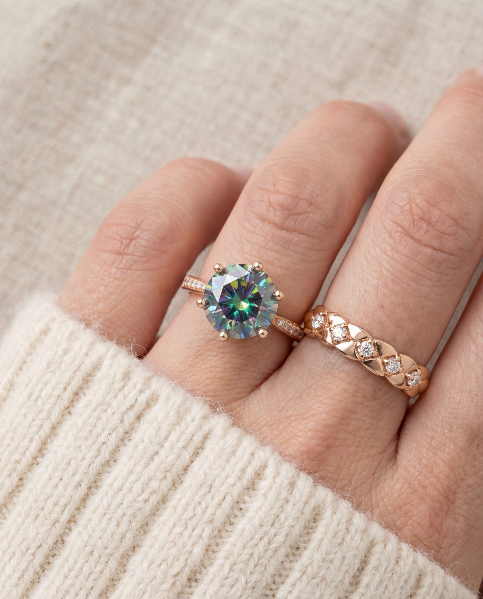 3 Carat Mystic Moissanite Ring in rose gold, worn on a model