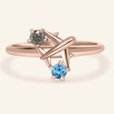 Close-up of the Wanderlust Ring | Moissanite in rose gold, resting on a warm linen background