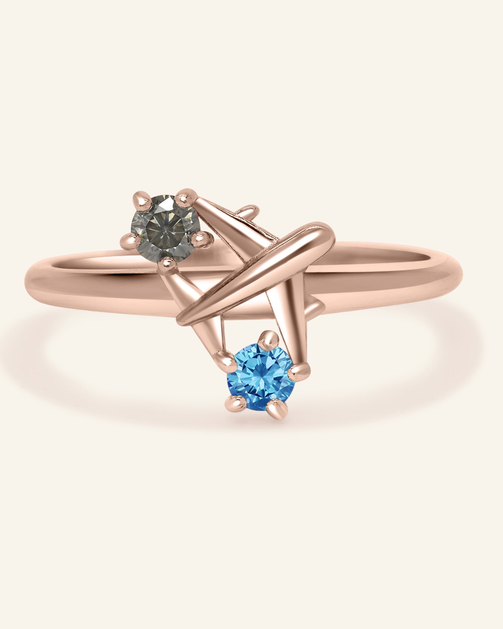 Close-up of the Wanderlust Ring | Moissanite in rose gold, resting on a warm linen background