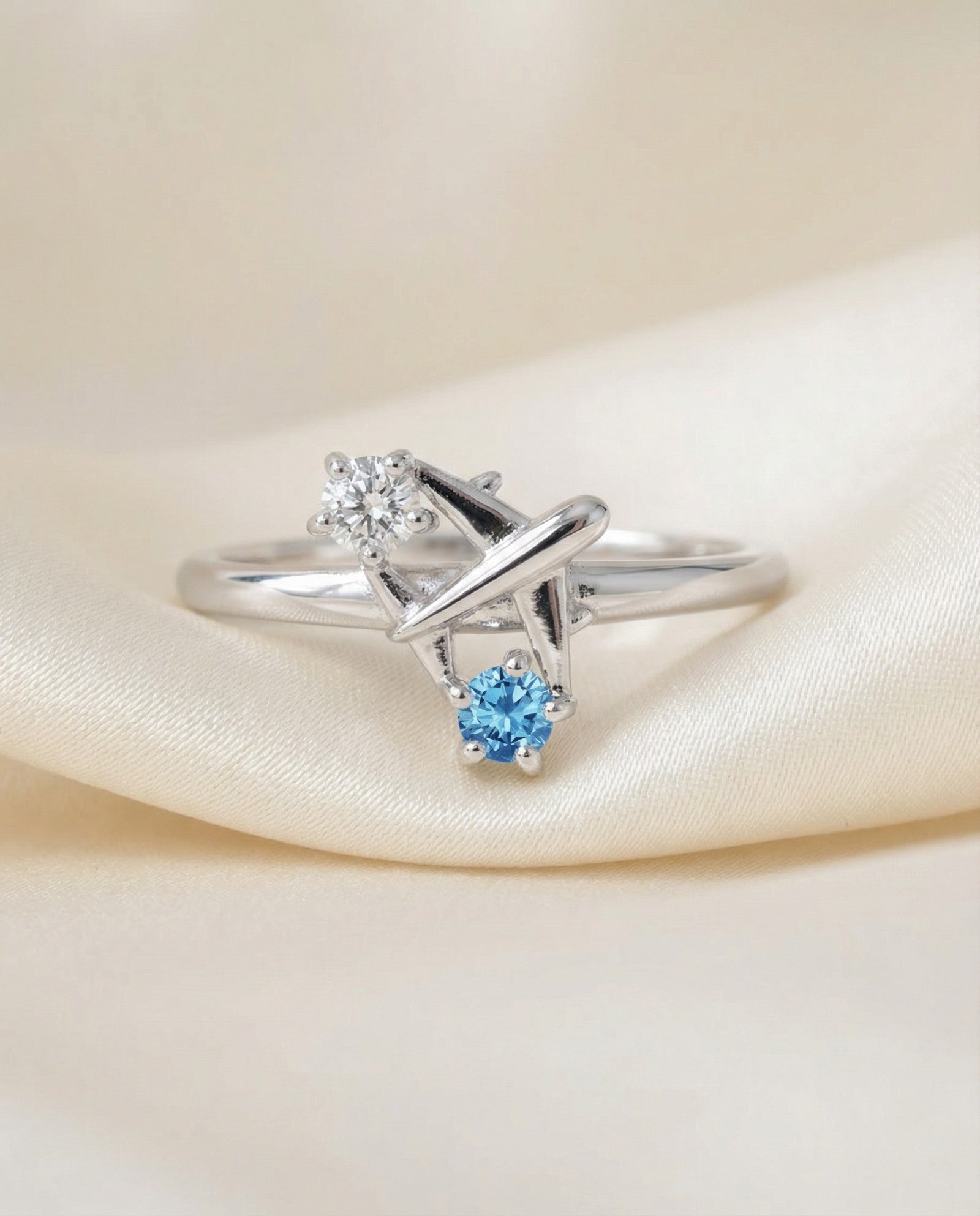 Wanderlust Ring | Moissanite in silver, laid flat on a tabletop