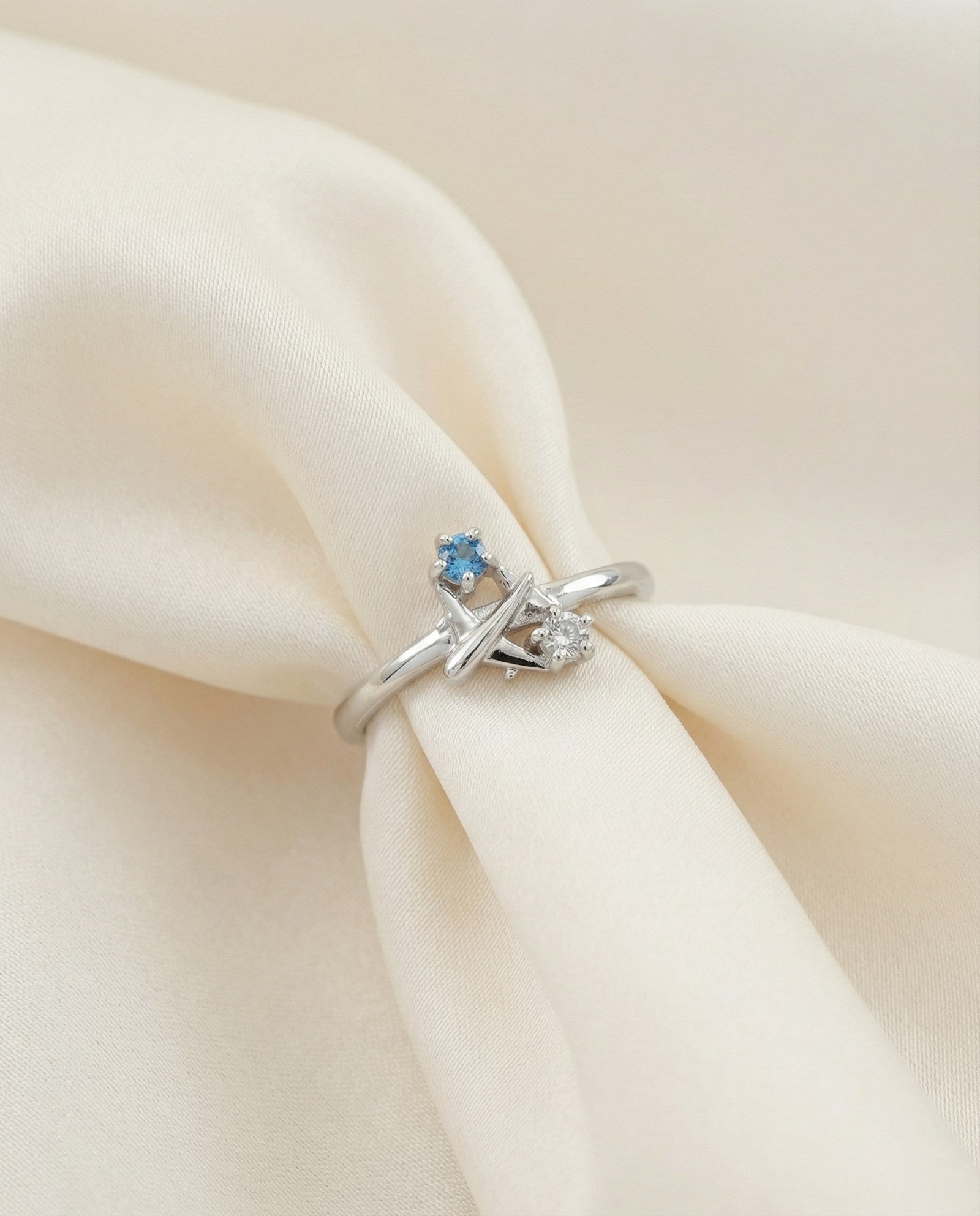 Wanderlust Ring | Moissanite in silver, laid flat on a tabletop