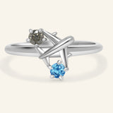 Wanderlust Ring | Moissanite in silver, resting on a warm linen background
