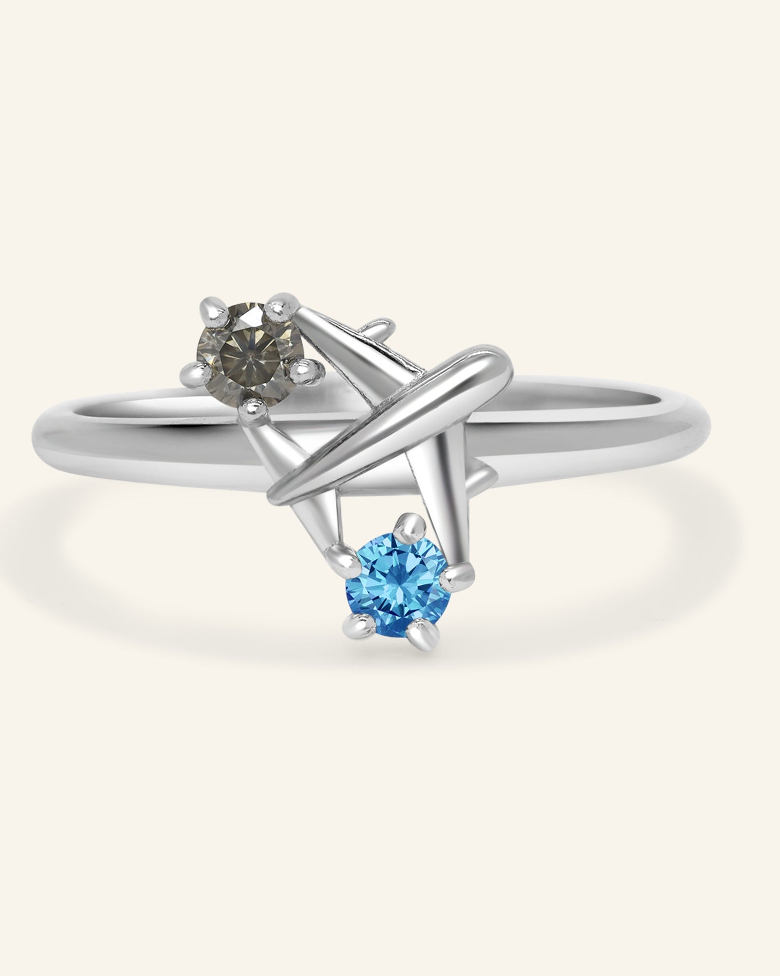 Wanderlust Ring | Moissanite in silver, resting on a warm linen background