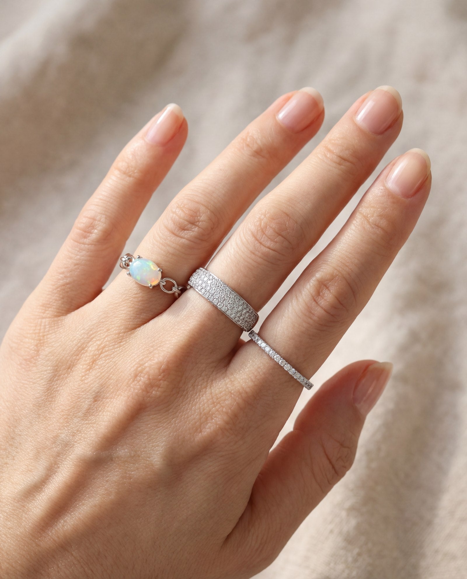 Astra Opal Ring in silver, worn on a model