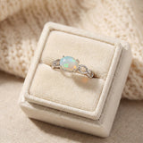 Astra Opal Ring in silver, laid flat on a tabletop
