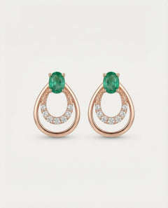 Professional product shot of Aura Emerald Drop Studs in Rose Gold with a clean white background.