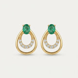 Professional product shot of Aura Emerald Drop Studs in Yellow Gold with a clean white background.