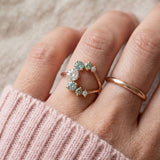 Aurora Crescent Moissanite Ring in rose gold, worn on a model, alternate angle