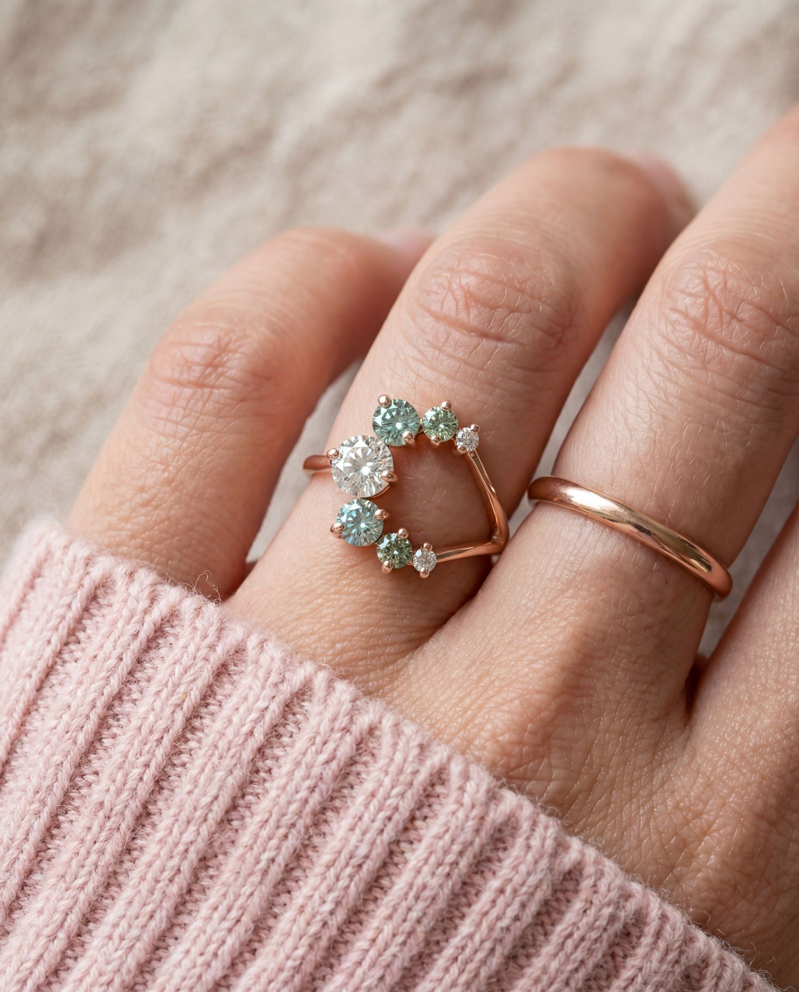 Aurora Crescent Moissanite Ring in rose gold, worn on a model, alternate angle