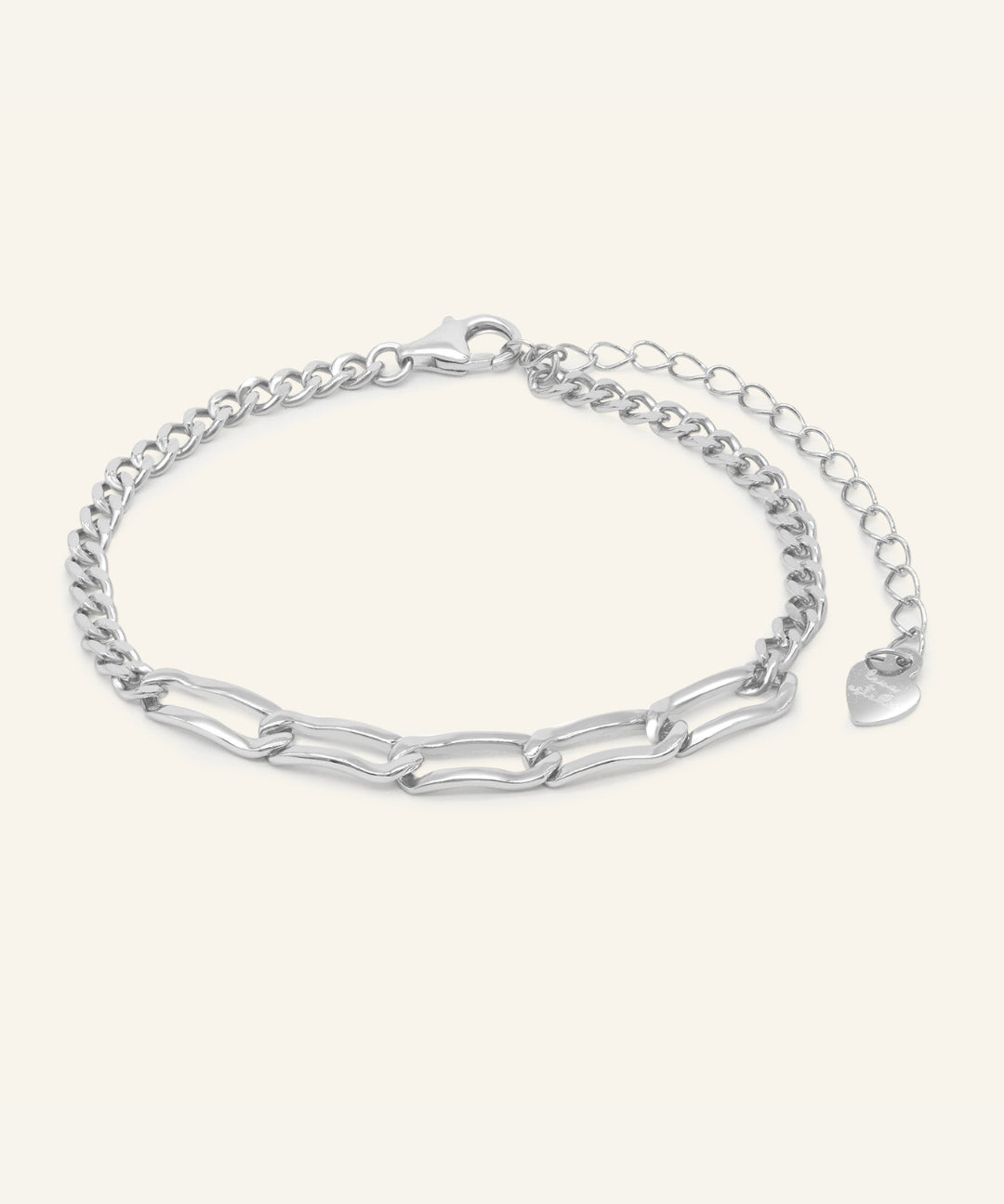 Boyfriend Curb Bracelet | Elate in silver, resting on a warm linen background
