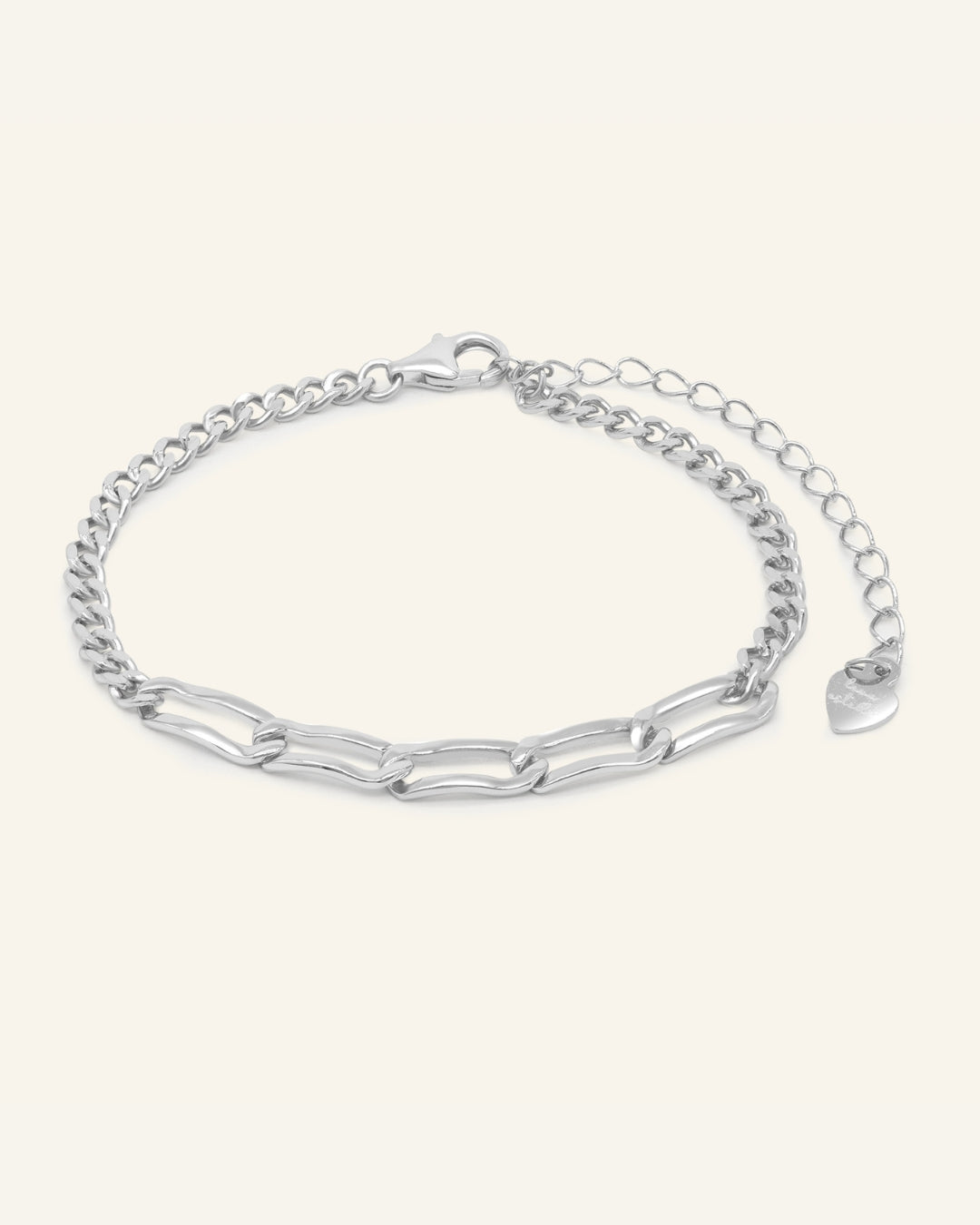Boyfriend Curb Bracelet | Elate in silver, resting on a warm linen background