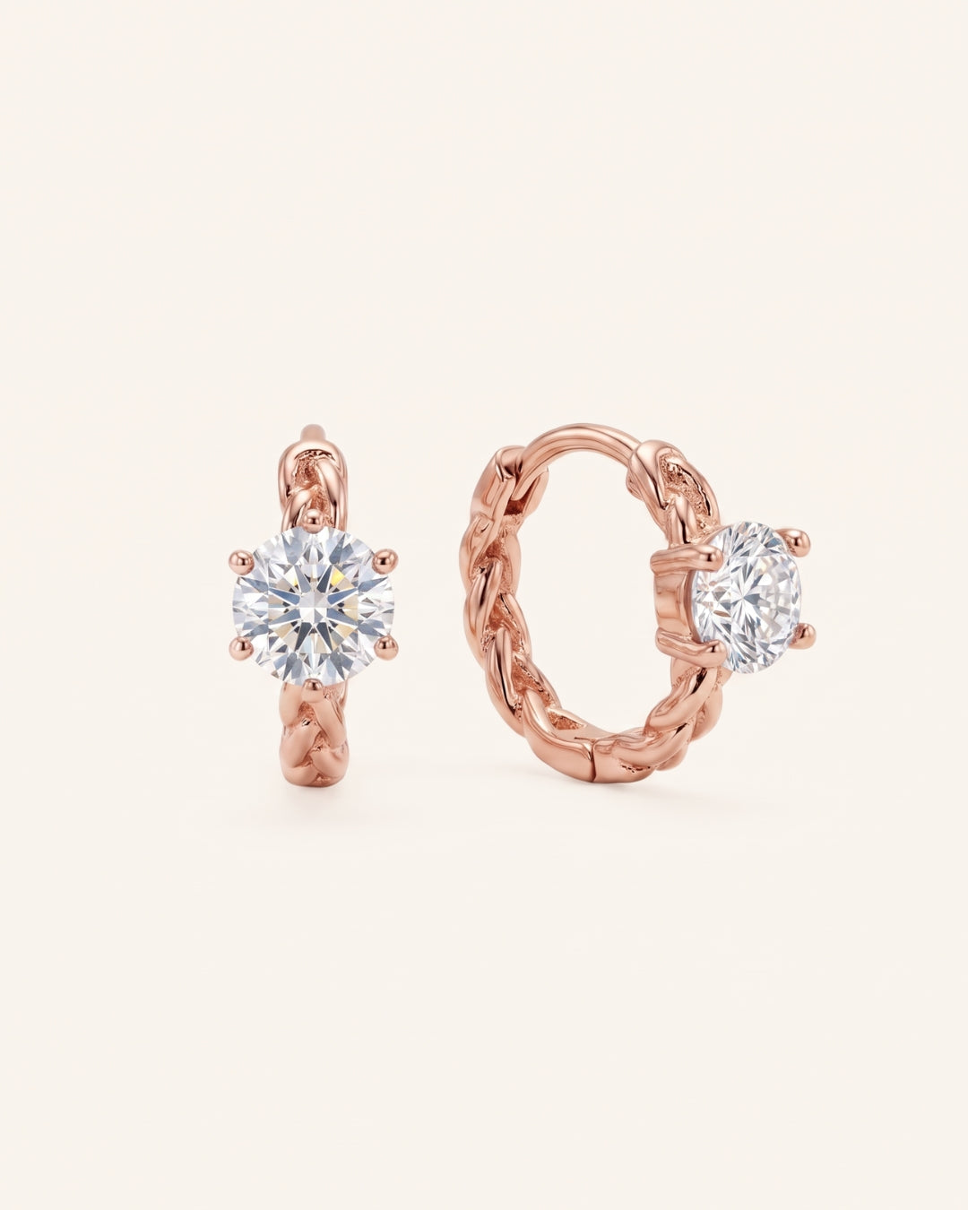 Pair of 18k rose gold vermeil Braided Moissanite Huggie Hoops featuring 0.5ct round white moissanite solitaire stones.