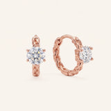 Pair of 18k rose gold vermeil Braided Moissanite Huggie Hoops featuring 0.5ct round white moissanite solitaire stones.
