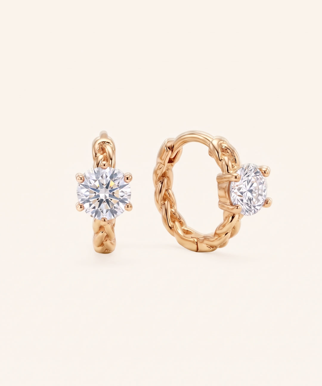 Pair of 18k yellow gold vermeil Braided Moissanite Huggie Hoops with 0.5ct round white moissanite stones and a woven band.