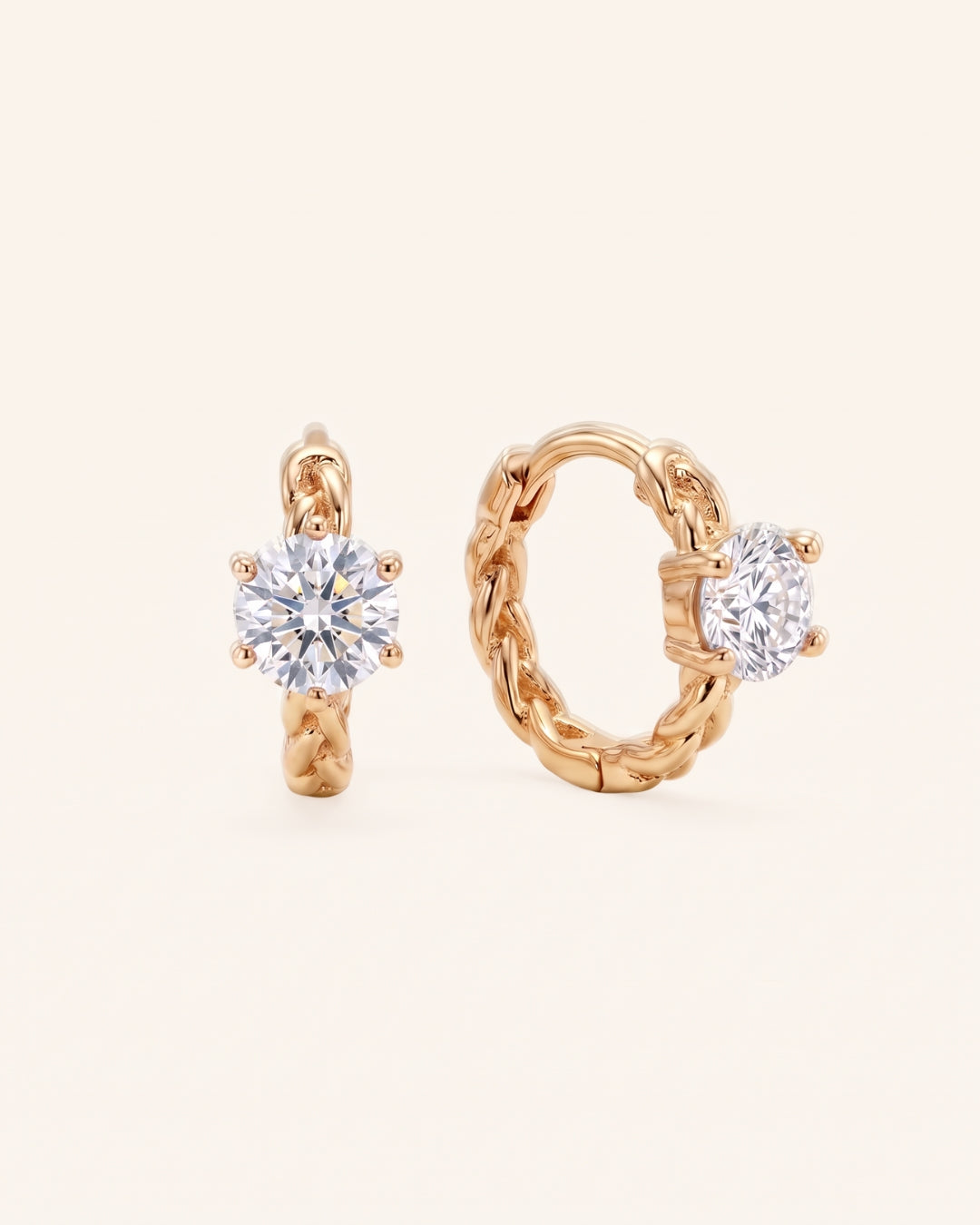 Pair of 18k yellow gold vermeil Braided Moissanite Huggie Hoops with 0.5ct round white moissanite stones and a woven band.