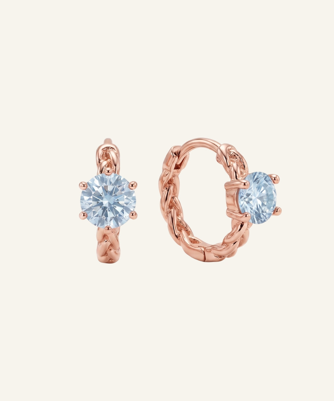 gold vermeil Braided Sky Blue Moissanite Huggie Hoops with 0.5ct round pastel sky blue moissanite solitaire center stones.