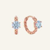 gold vermeil Braided Sky Blue Moissanite Huggie Hoops with 0.5ct round pastel sky blue moissanite solitaire center stones.