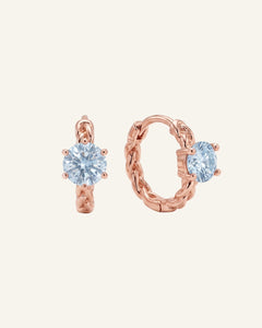 gold vermeil Braided Sky Blue Moissanite Huggie Hoops with 0.5ct round pastel sky blue moissanite solitaire center stones.