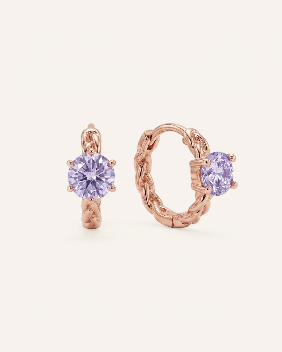 Pair of 18k rose gold vermeil Braided Lavender Moissanite Huggie Hoops featuring 0.5ct round light purple moissanite solitaire stones.
