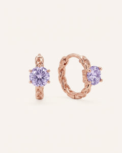 Pair of 18k rose gold vermeil Braided Lavender Moissanite Huggie Hoops featuring 0.5ct round light purple moissanite solitaire stones.