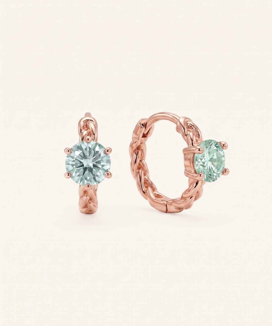 Pair of 18k rose gold vermeil Braided Mint Moissanite Huggie Hoops with 0.5ct round pastel green moissanite solitaire center stones.