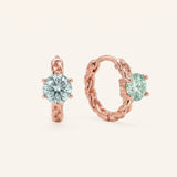 Pair of 18k rose gold vermeil Braided Mint Moissanite Huggie Hoops with 0.5ct round pastel green moissanite solitaire center stones.