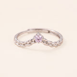 Sterling silver Braided Wishbone Moissanite Ring set with a 0.1ct pastel purple lavender moissanite center stone.