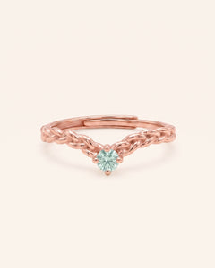 18k rose gold vermeil Braided Wishbone Moissanite Ring with a 0.1ct round mint moissanite center stone.