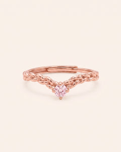 18k rose gold vermeil Braided Wishbone Moissanite Ring set with a 0.1ct round pastel pink moissanite solitaire center stone.