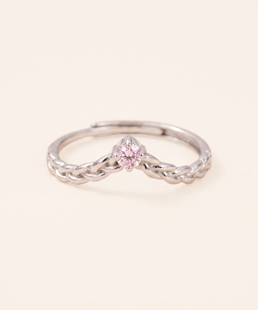 Sterling silver Braided Wishbone Moissanite Ring set with a 0.1ct pastel pink moissanite center stone.