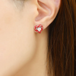 candy cane switch earrings in white topaz on model