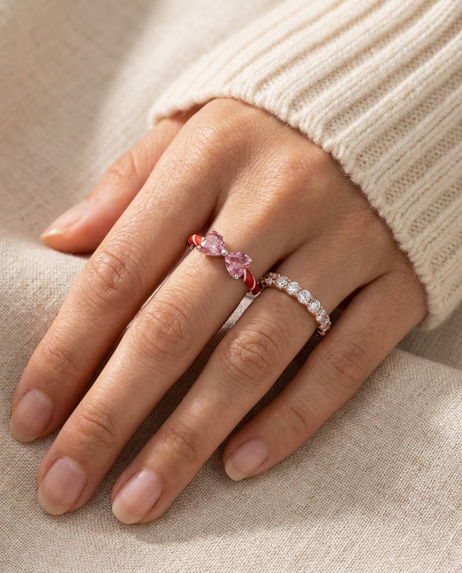 Candy Cane Ribbon Ring | Red Moissanite in silver, worn on a model