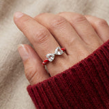 Candy Cane Ribbon Ring | Topaz in silver, worn on a model