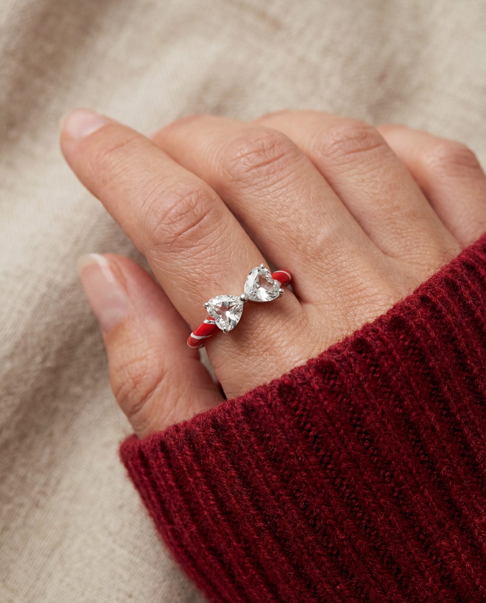 Candy Cane Ribbon Ring | Topaz in silver, worn on a model