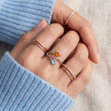 Celestial Harmony Ring | Orange Opal in rose gold, worn on a model