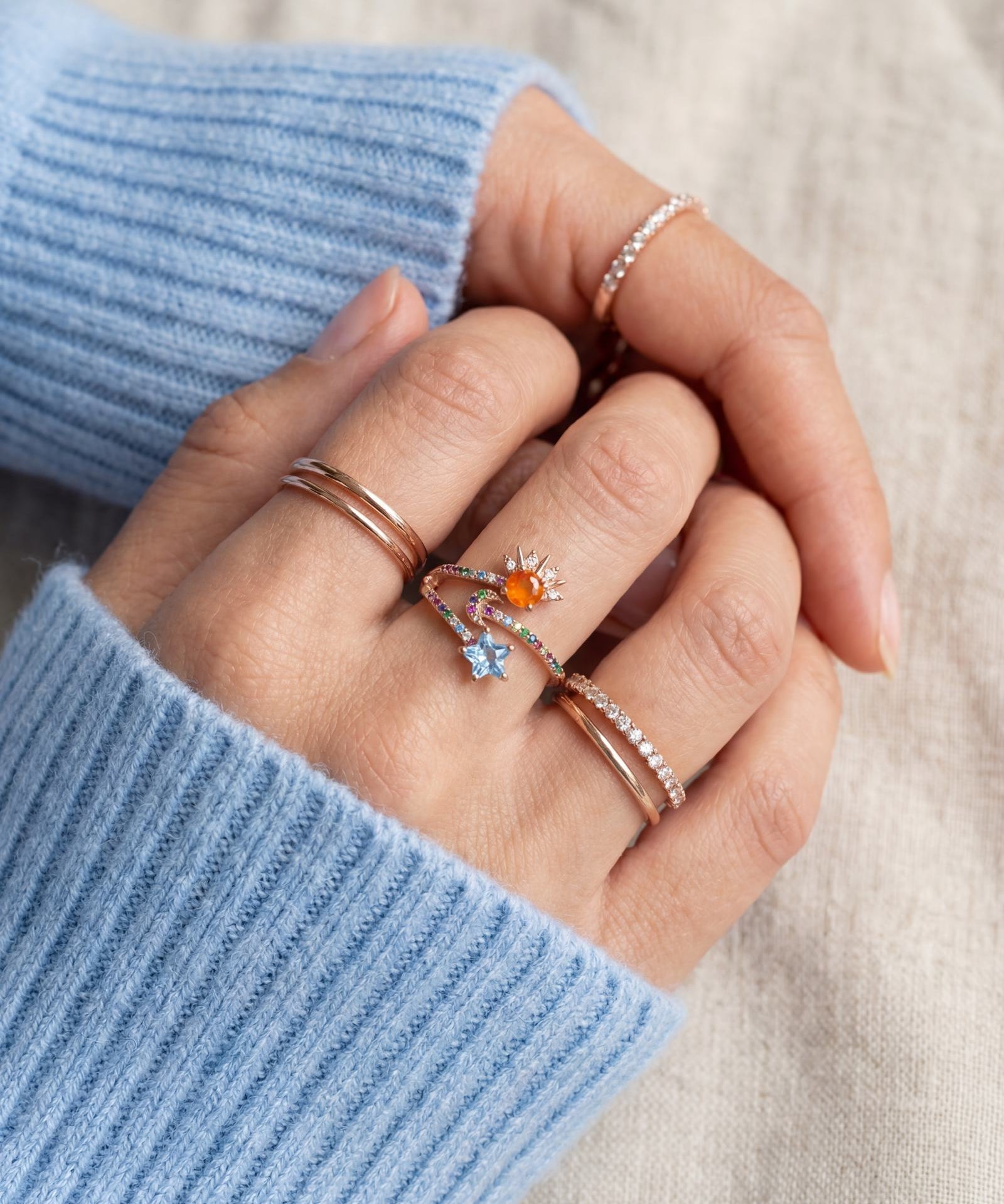 Celestial Harmony Ring | Orange Opal in rose gold, worn on a model
