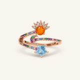 Close-up of the Celestial Harmony Ring | Orange Opal in rose gold, resting on a warm linen background