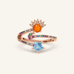 Close-up of the Celestial Harmony Ring | Orange Opal in rose gold, resting on a warm linen background