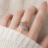 Celestial Harmony Ring | Orange Opal in silver, worn on a model