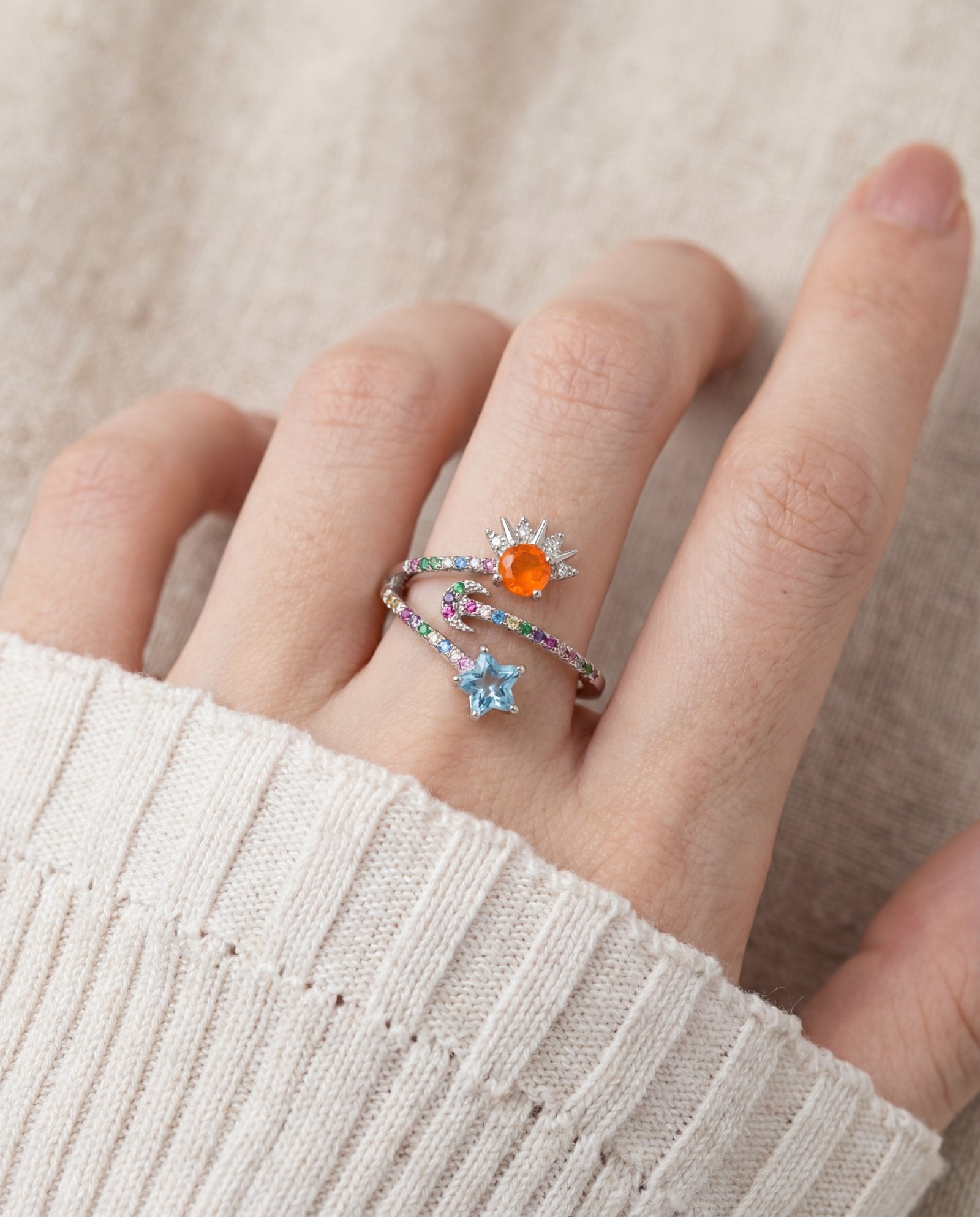 Celestial Harmony Ring | Orange Opal in silver, worn on a model