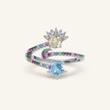 Close-up of the Celestial Harmony Ring | Yellow Moissanite in silver, resting on a warm linen background