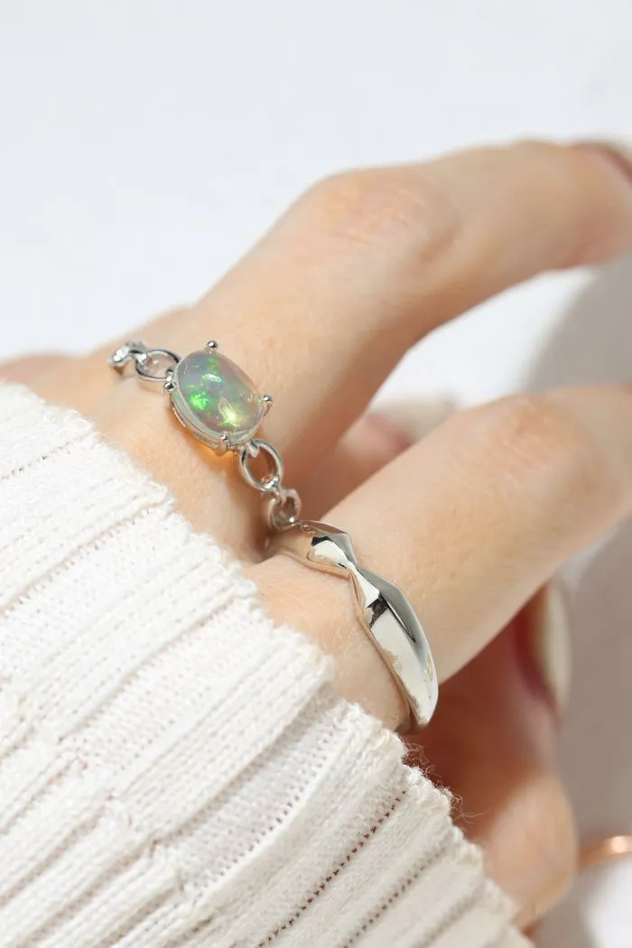 basic silver stack featuring opal ring and a simple silver stacker