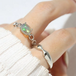 basic silver stack featuring opal ring and a simple silver stacker