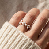 Trinity Clover Ring in rose gold, worn on a model