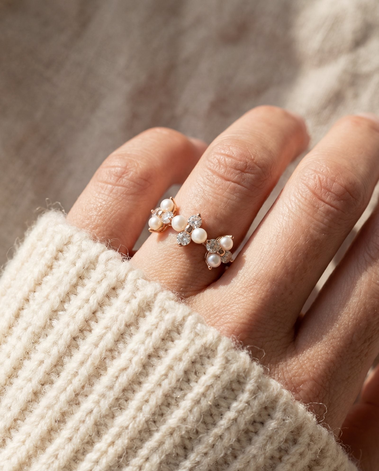 Trinity Clover Ring in rose gold, worn on a model