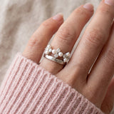 Trinity Clover Ring in silver, worn on a model