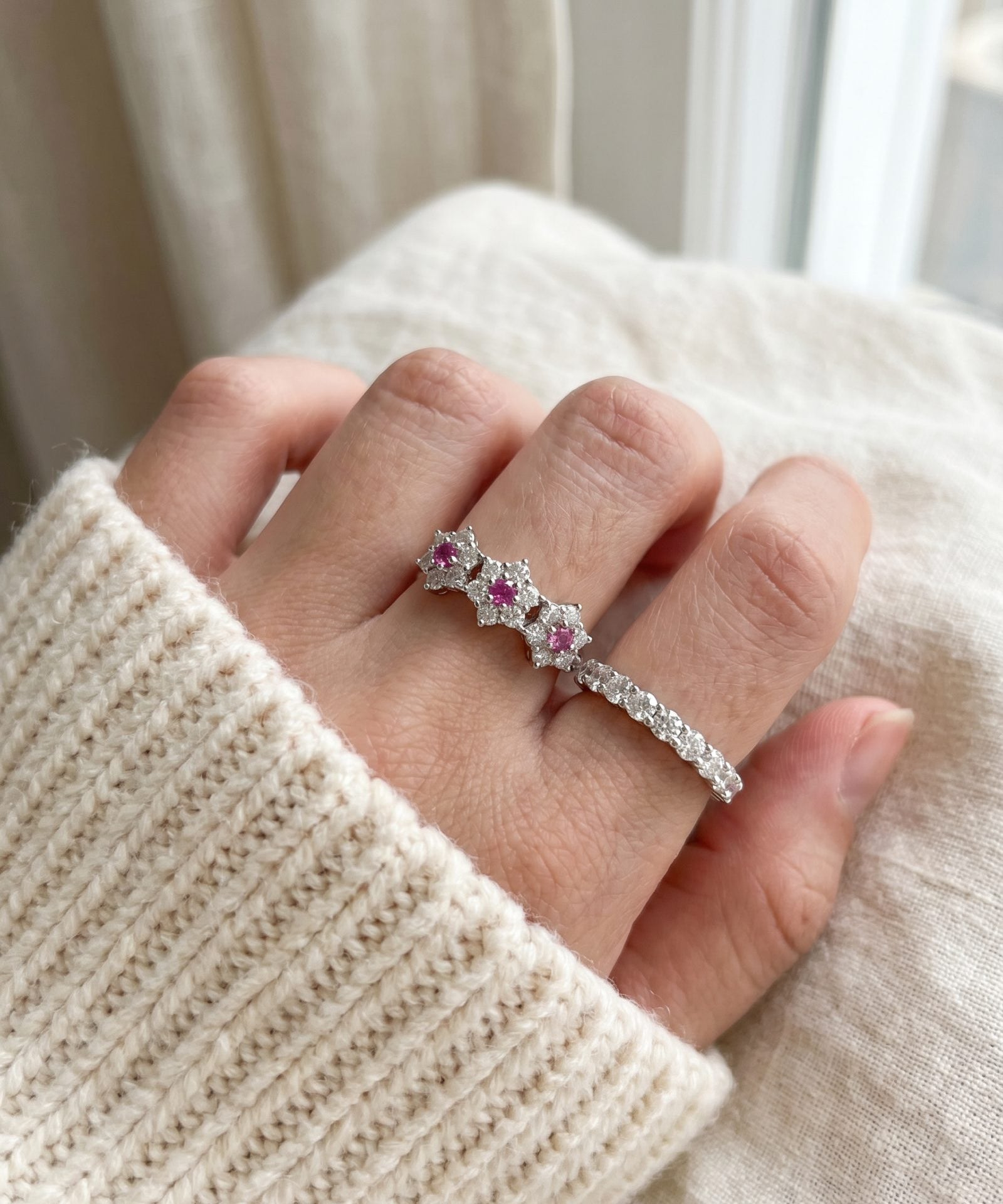 Lifestyle model shot of the Coquette Bloom natural pink sapphire ring, showcasing the romantic and feminine coquette aesthetic.